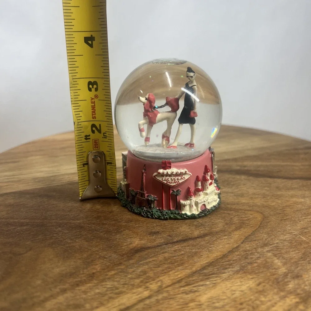 Las Vegas Glitter Snow Globe Landmarks 3.5 Inch.  Woman With Dog Figurine.‎